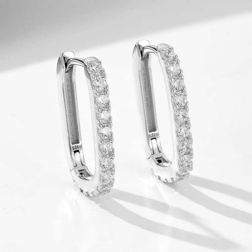 Sterling silver oval zircon ear clip earrings with geometric design in yellow and white options
