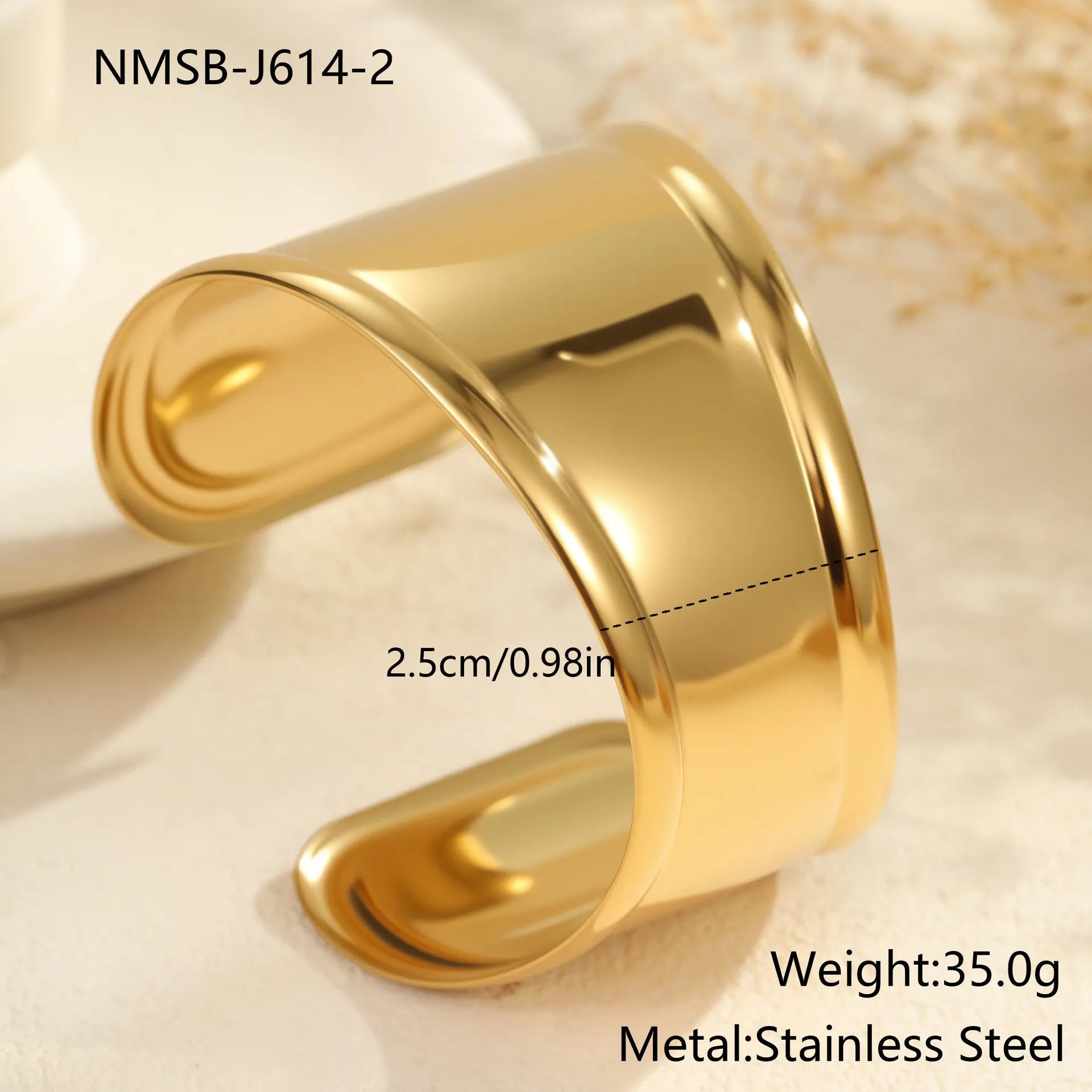 Women's wide fashion bracelet with wave design in gold-plated stainless steel
