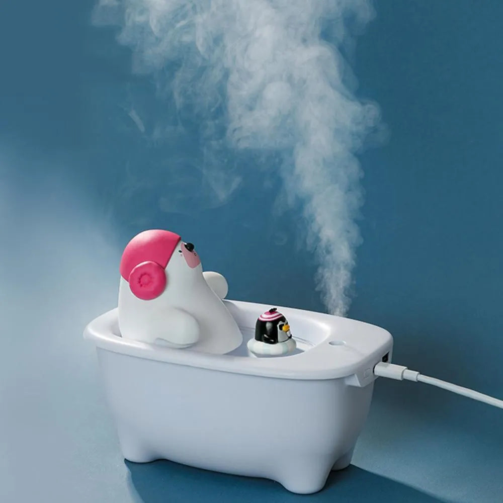 White USB air humidifier and aromatherapy diffuser with large water tank on a desk