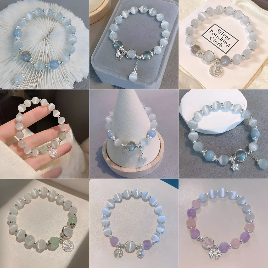 Women's glass butterfly drop-shape bracelet in a grey colourway with round details.