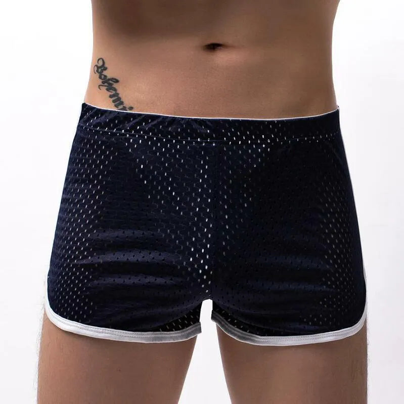 Men's cotton three-point boxer shorts in light blue on a grey background
