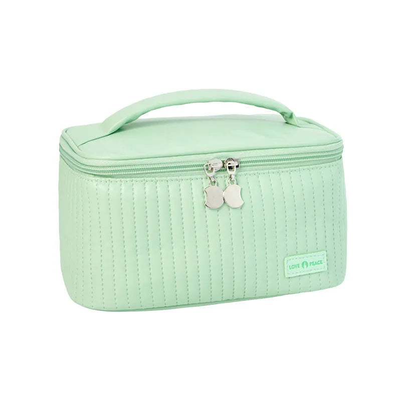 Open-top cake-shaped makeup bag in soft pastel PU leather