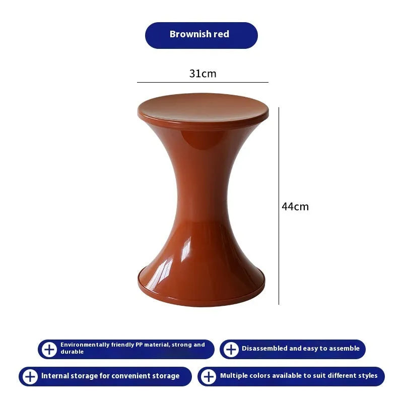 Plastic hourglass-shaped shoe changing stool shown in available colours.