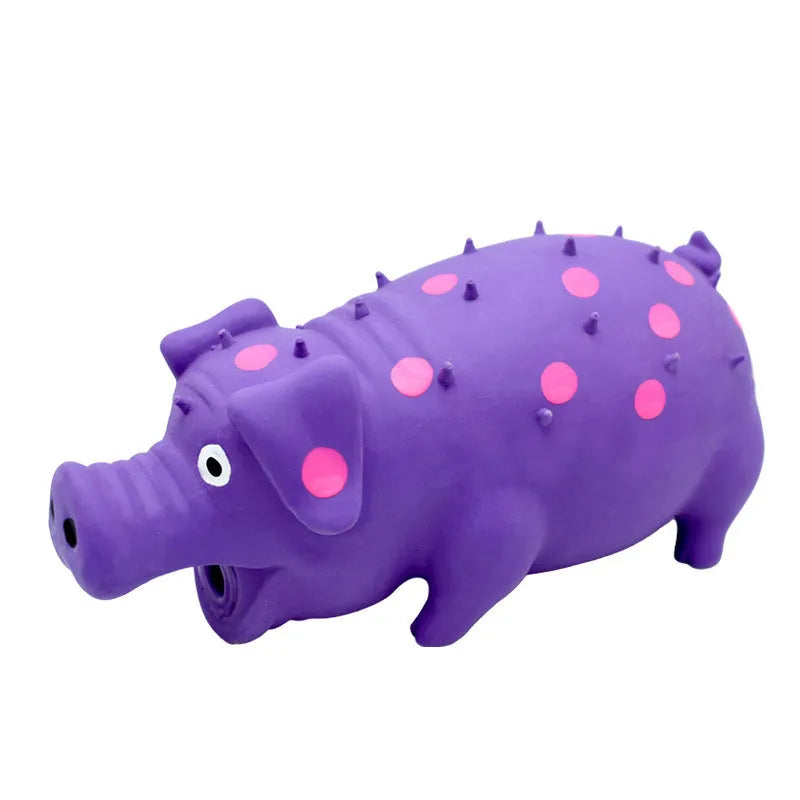Colourful pig-shaped latex dog chew toy with textured surface for teeth cleaning