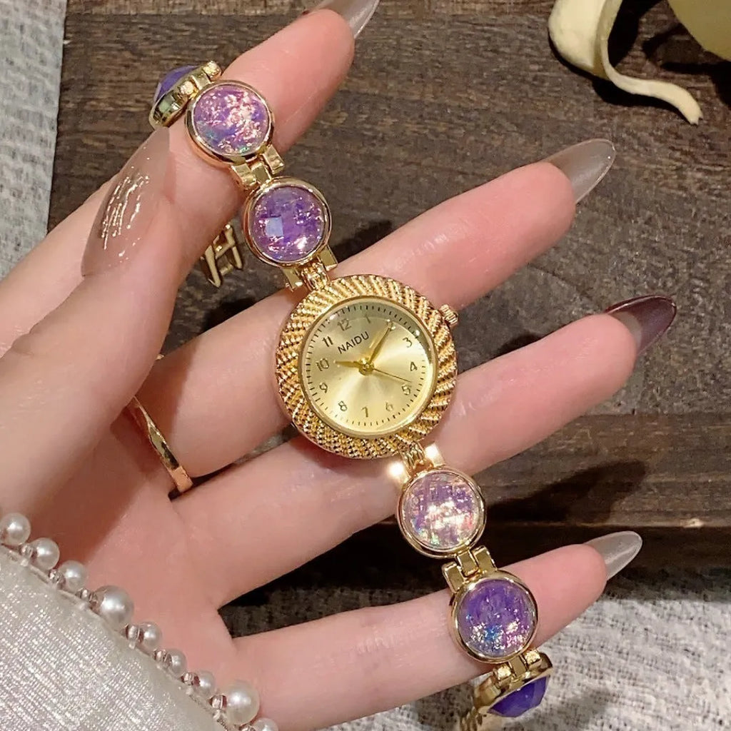 Women's quartz watch with 25mm round dial and zinc alloy case in a choice of six colours.