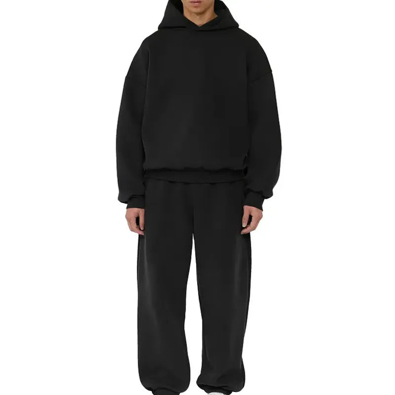 A man's grey fleece-lined cotton pullover hoodie on a hanger.