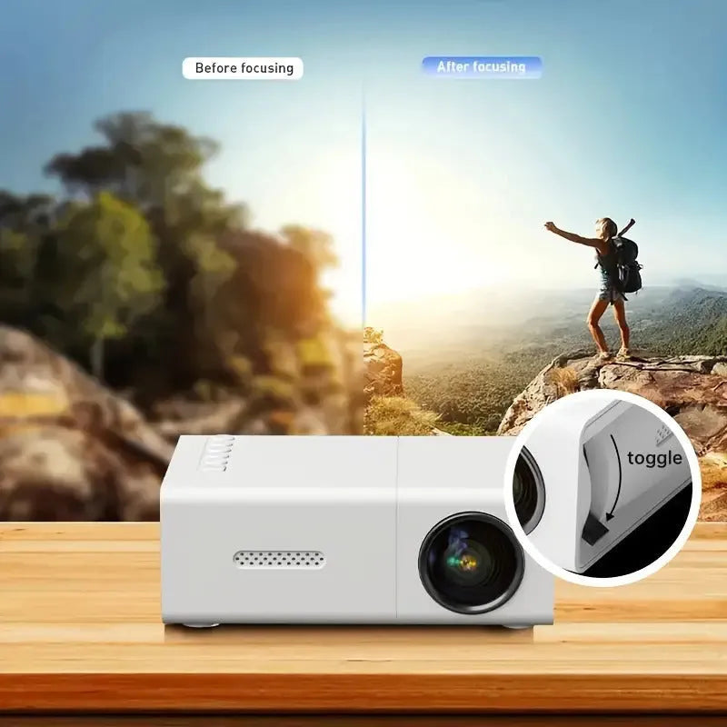 White or black M100 Mini Portable LED Projector displaying a large screen image.