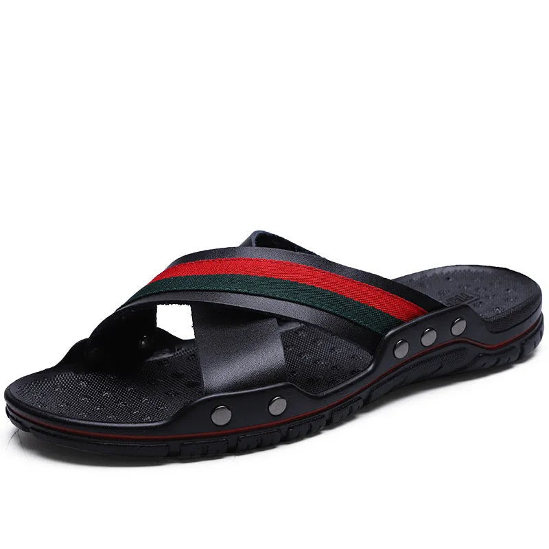 Men's white cowhide leather flip-flop sandals with a non-slip PU sole on a beach background.