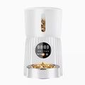 Black automatic pet feeder with digital display and food container for dogs and cats