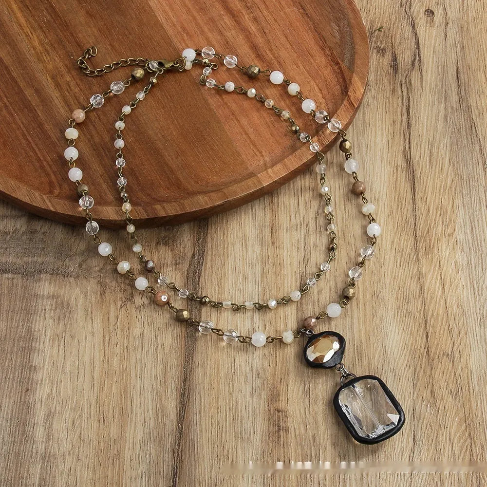 Tribal style layered necklace with natural stone and glass pendant on adjustable chain