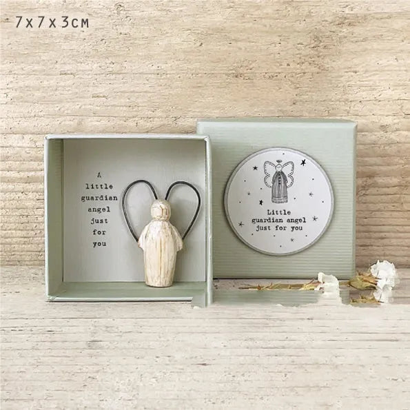 Guardian angel resin ornament with cartoon styling and modern simplicity design