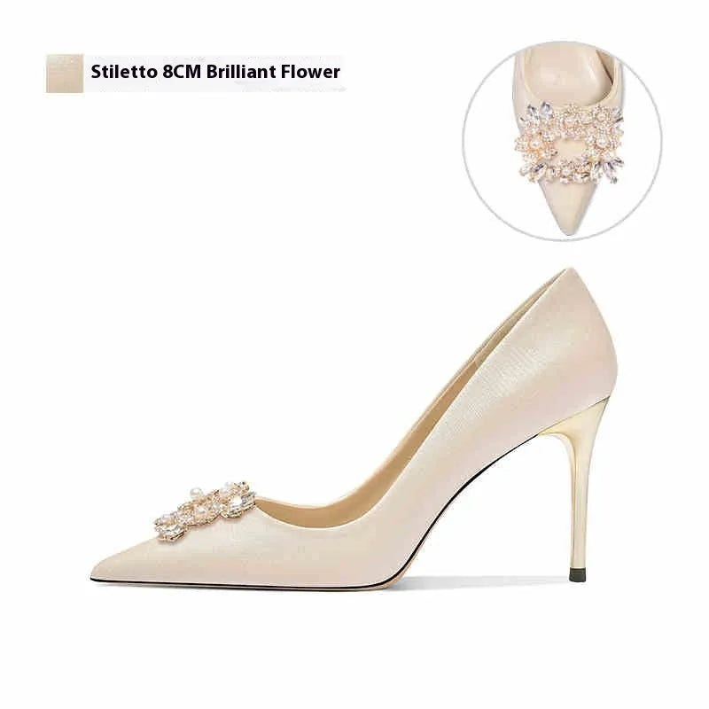 Women's French crystal wedding high heels with rhinestones on cloth upper and pointed toe.
