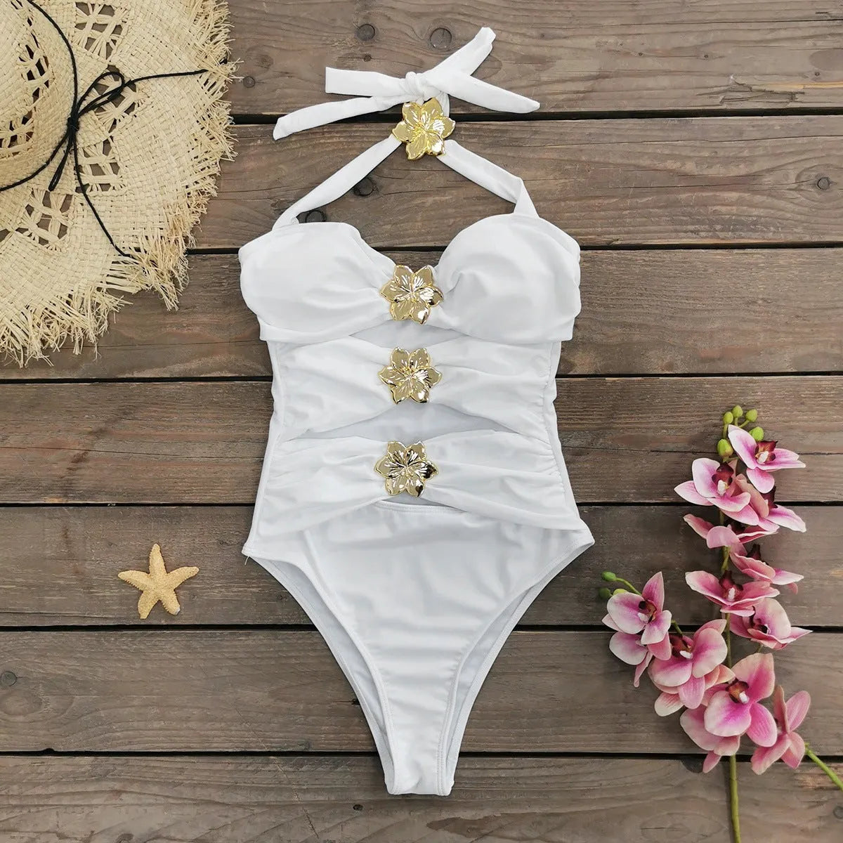 Adult female one-piece swimsuit with hollow-out tube top and matching short skirt in solid colour