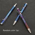 Titanium alloy gun bolt handle ball pen with a randomised phantom colour finish on a dark background.