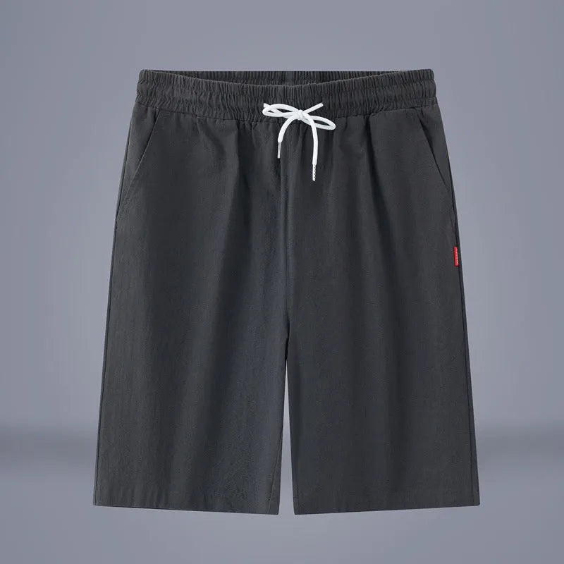 Solid colour cotton linen cropped summer pants with a drawstring waist on a hanger.