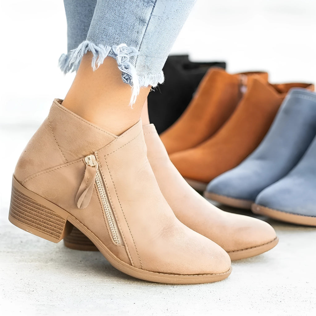 Women's blue suede Dr Martens-style ankle boots with chunky heel and side zip
