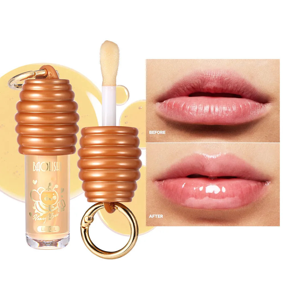 Honey lip gloss attached to keychain with pannier bag connector