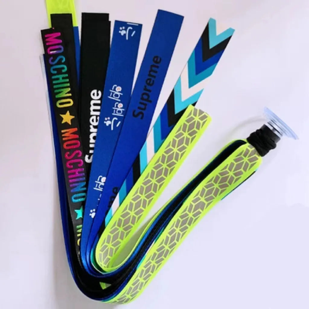 Close-up of a colourful decorative ribbon streamer attached to a child's helmet for roller skating or skiing.