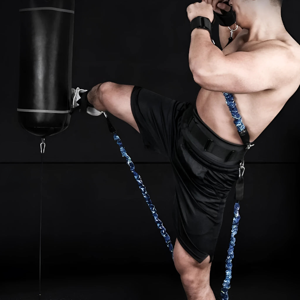 Fitness Bounce chest expander belt with TPE elastic tube and colour-coded resistance sleeves: red, blue, black, green.