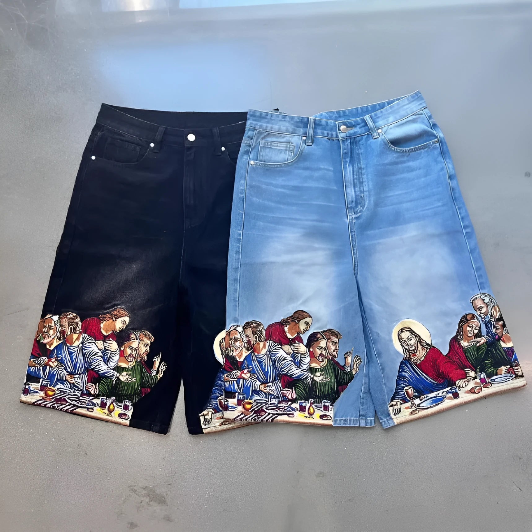 Blue men's cotton shorts with a Jesus design printed on the back pocket, showing tapered leg fit.