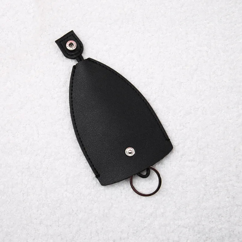 Cartoon pull-out key case in PU leather showing design options including resin fruit and big cartoon animal prints.