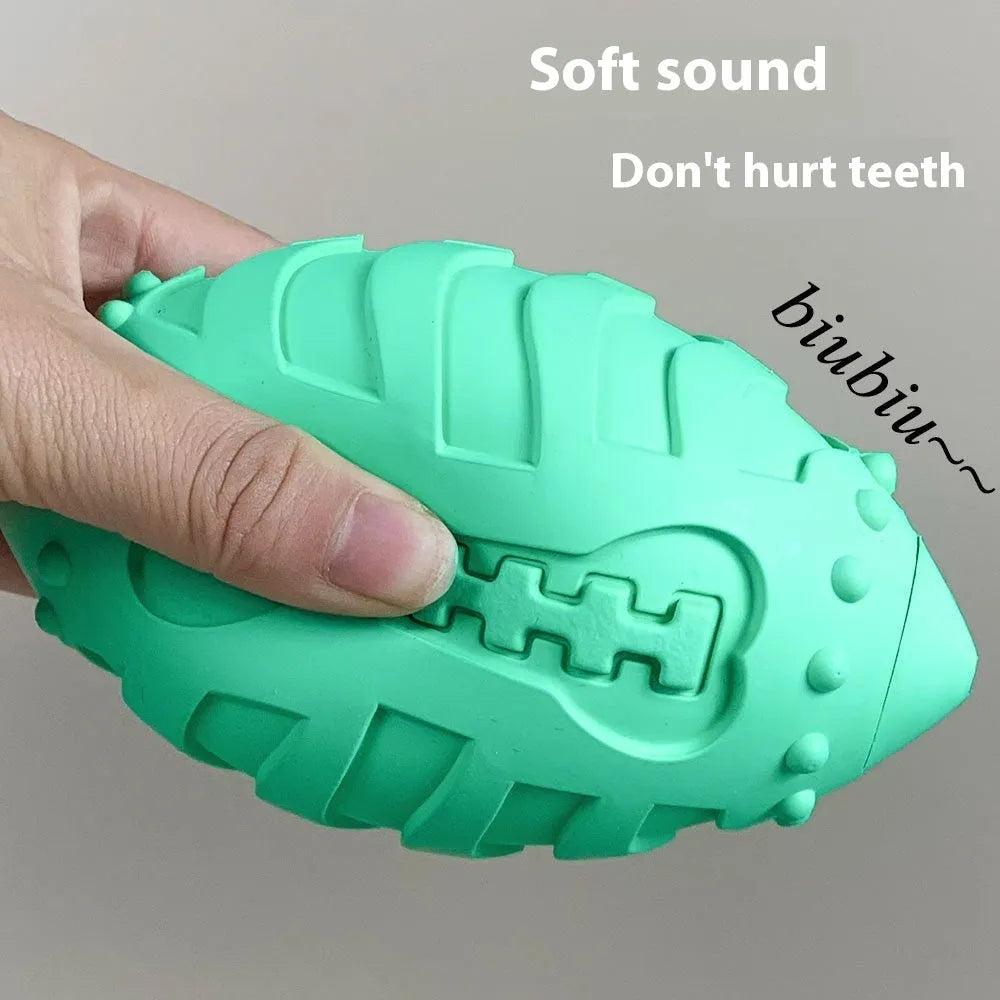 Sapphire blue rugby-shaped rubber dog toy with textured surface for teeth cleaning
