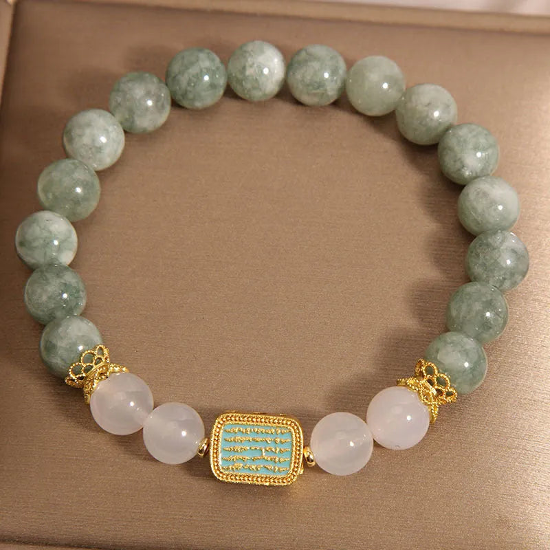 Women's oil green emerald crystal bracelet with five-strand design on female wrist