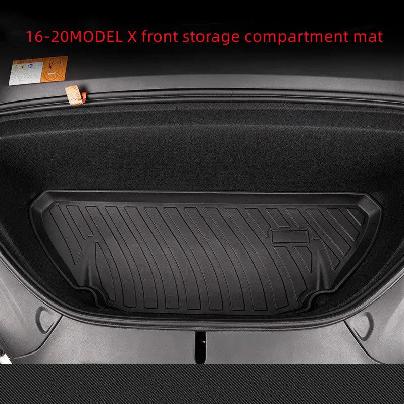 Custom rubber floor mats for Tesla cars with a textured TPE driver footrest section.