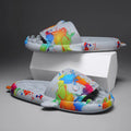 Shark design open-toe EVA home slippers for couples in beige, shown in a large size.