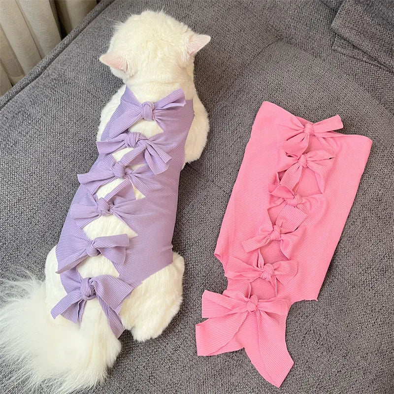 Lace-up polyester cat sterilisation clothing in blue colour showing adjustable fastening system for postoperative recovery
