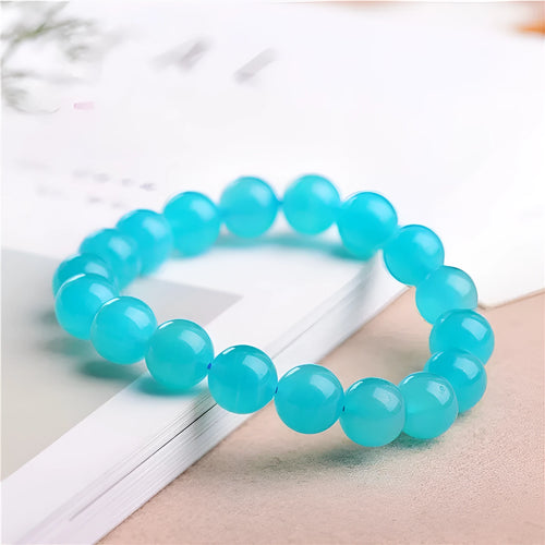Natural 7A grade ice blue amazonite beads on a string, showing polished surfaces and varying sizes.