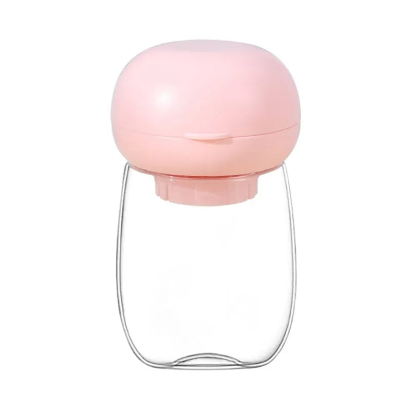 Portable dog water bottle with press-button cup in white on a green background