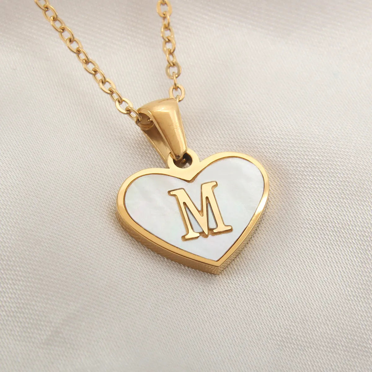 Gold plated personalised heart necklace with white shell on a 45cm chain