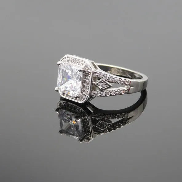 Women's geometric zircon ring with hollow ornamental design and quadrilateral pattern in platinum colour