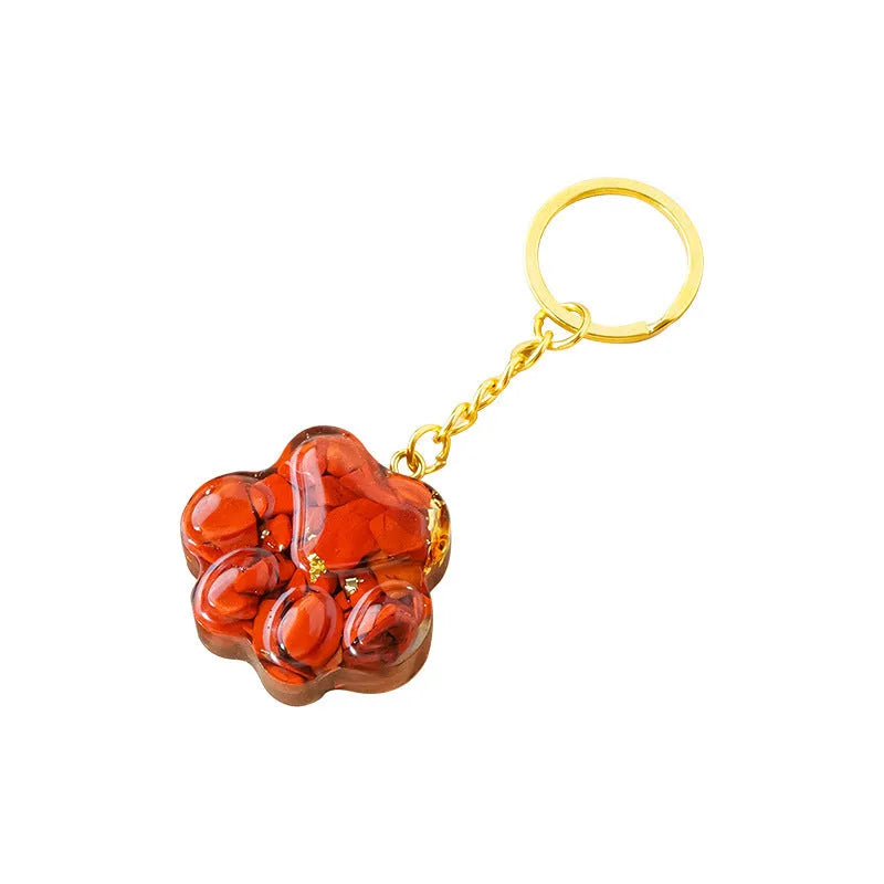 Small natural crystal cat's paw shaped pendant on a metal keyring, available in various crystal colours.