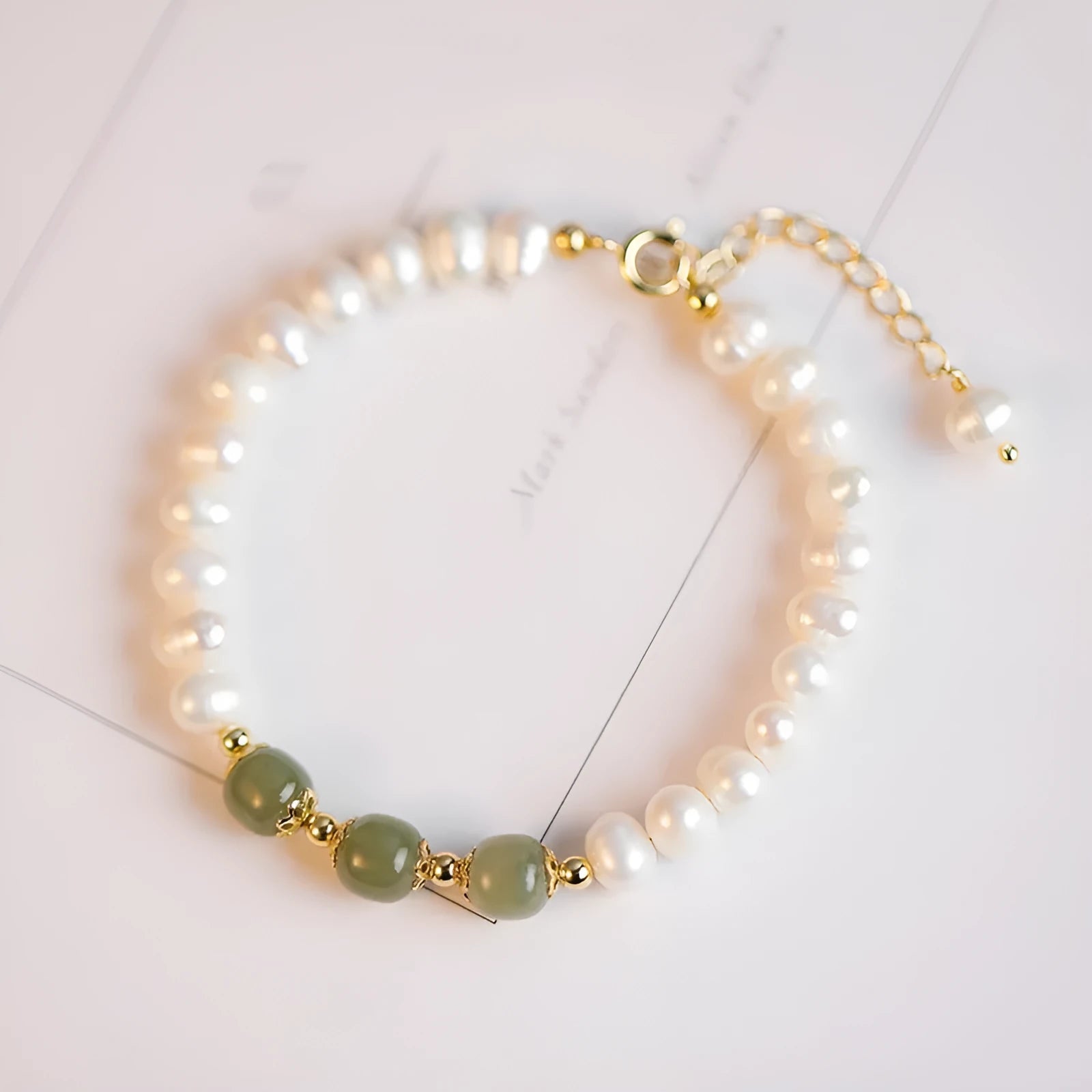 Korean style natural freshwater diamond pearl bracelet with electroplated finish in Hetian jade colours.
