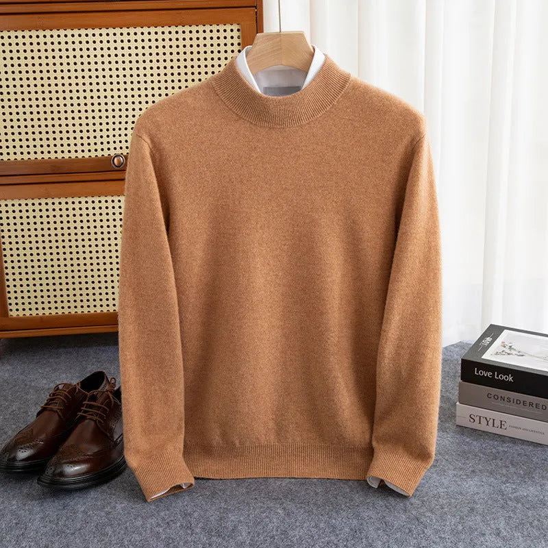 Man wearing a loose-fit half-collar wool sweater in a textured knit, shown in one of the available colours like camel or dark grey.