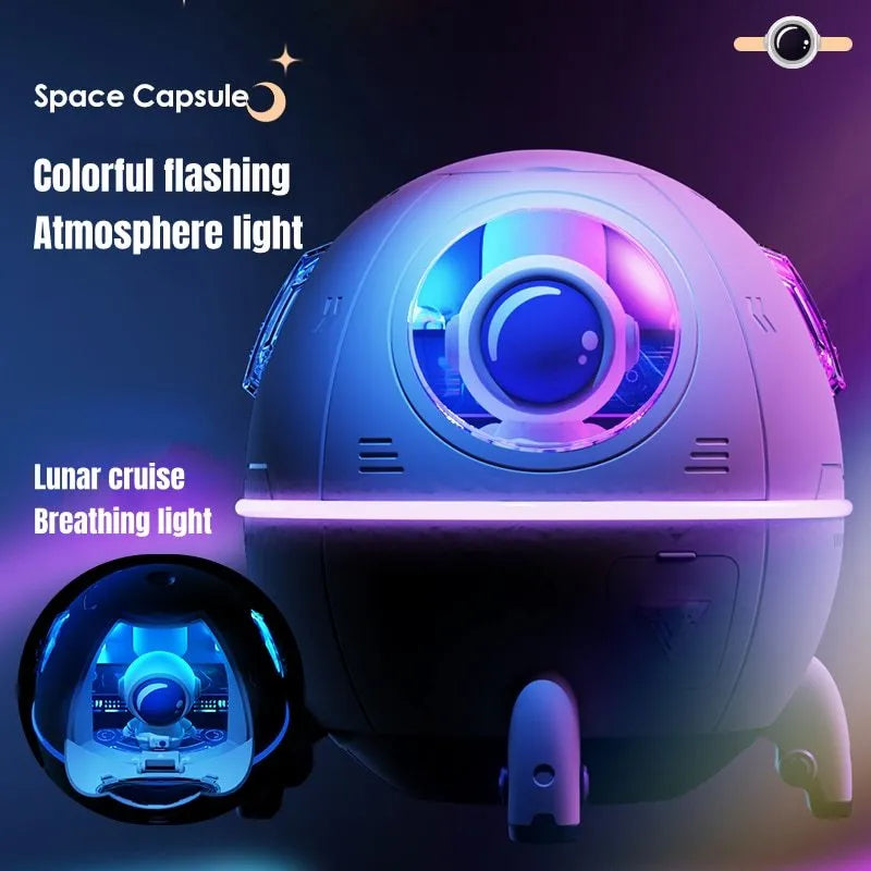 Purple astronaut-shaped USB desktop humidifier with LED light on wooden desk