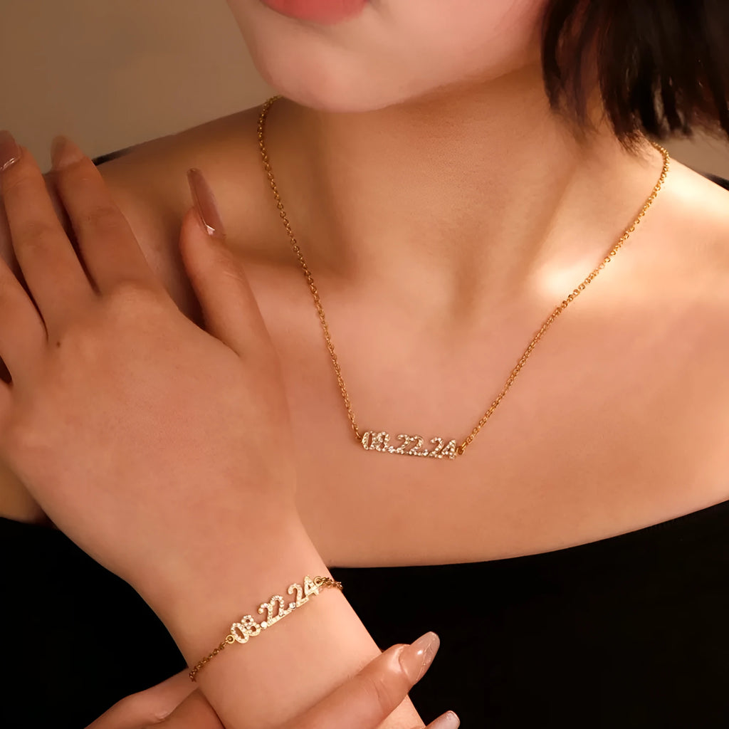 Stainless steel digital bracelet with diamond numerals on a metallic background.