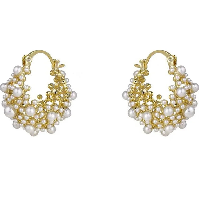 Women's gold-coloured copper flower basket earrings with small bead detailing and pearl inlay treatment