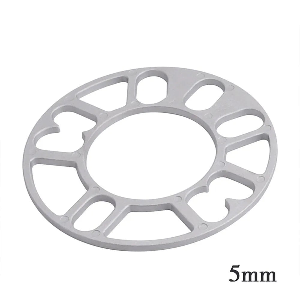 Automotive wheel hub widening gasket spacer in various thicknesses for brake clearance.
