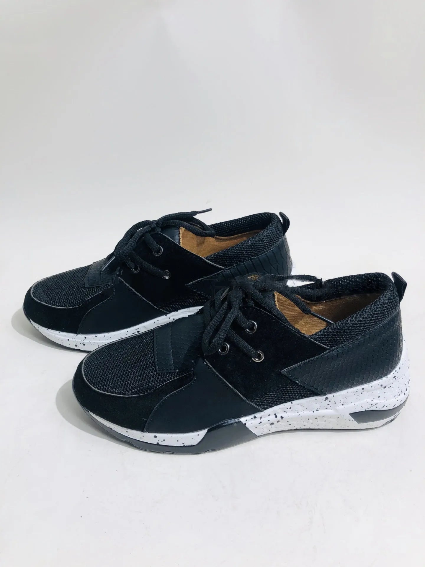 Women's casual suede sneakers with wedge heel in black, leopard, panther, pink, and snake pattern colours