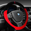 Winter short plush flocking steering wheel cover in black red on a car steering wheel