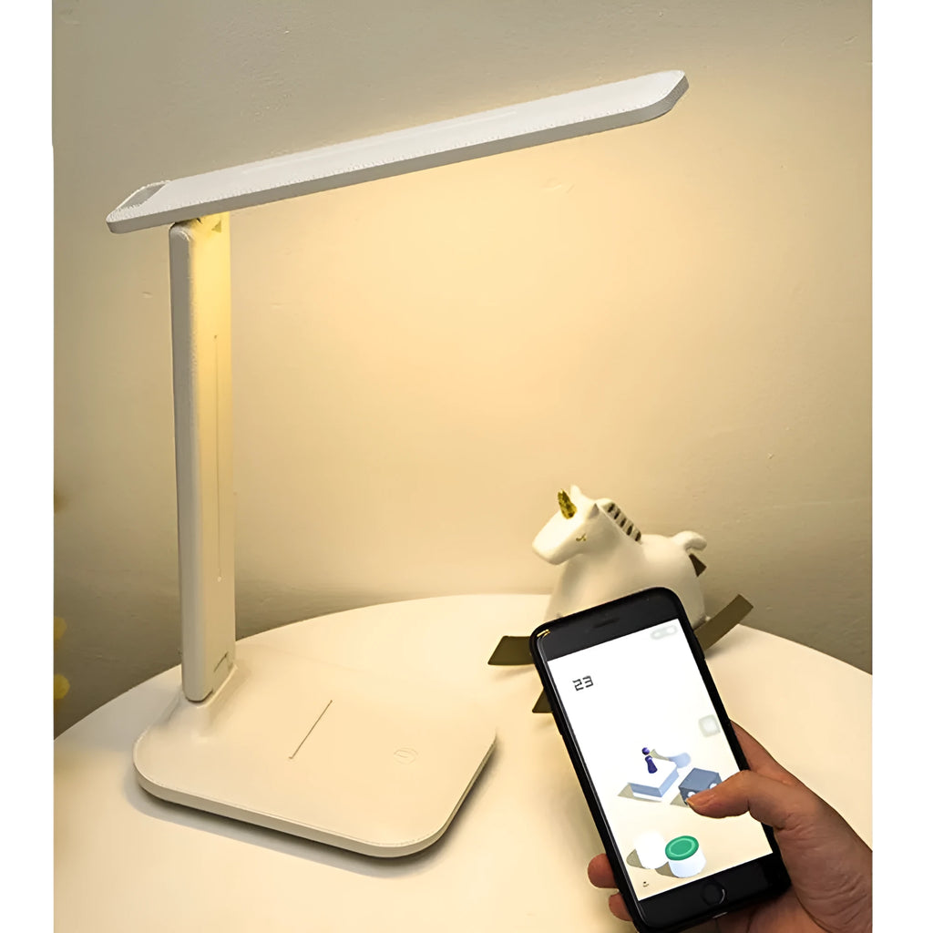 White plastic bedside lamp with touch controls for children's bedrooms