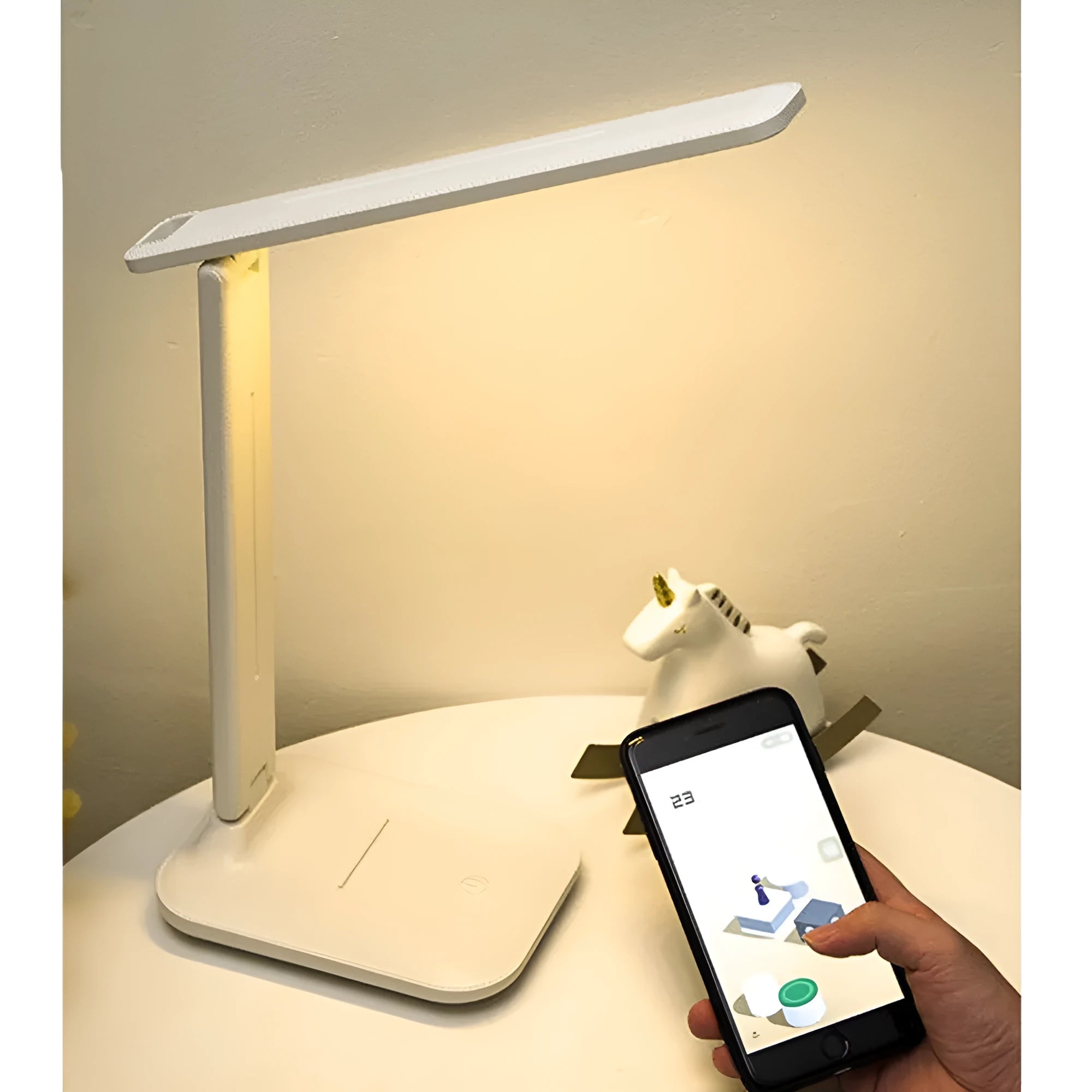 White plastic bedside lamp with touch controls for children's bedrooms