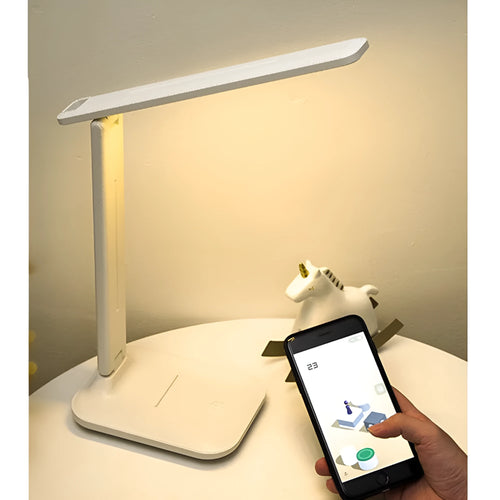 White plastic bedside lamp with touch controls for children's bedrooms