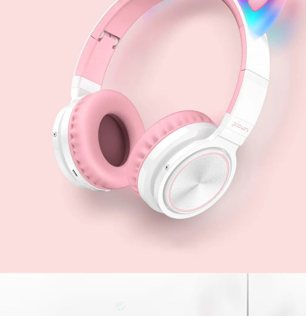 Pink white Bluetooth wireless over-ear headphones with braided cable and built-in microphone