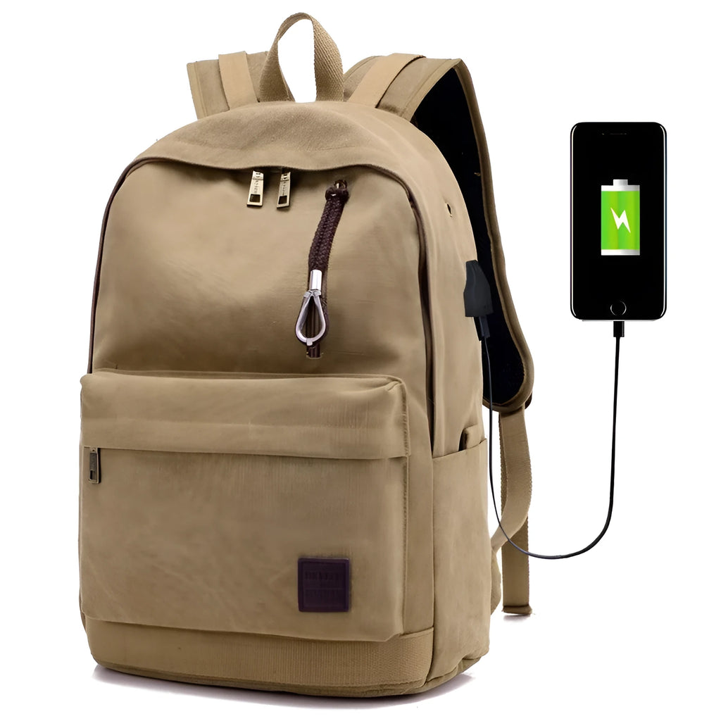 Canvas USB rechargeable backpack in grey showing front pocket and shoulder strap
