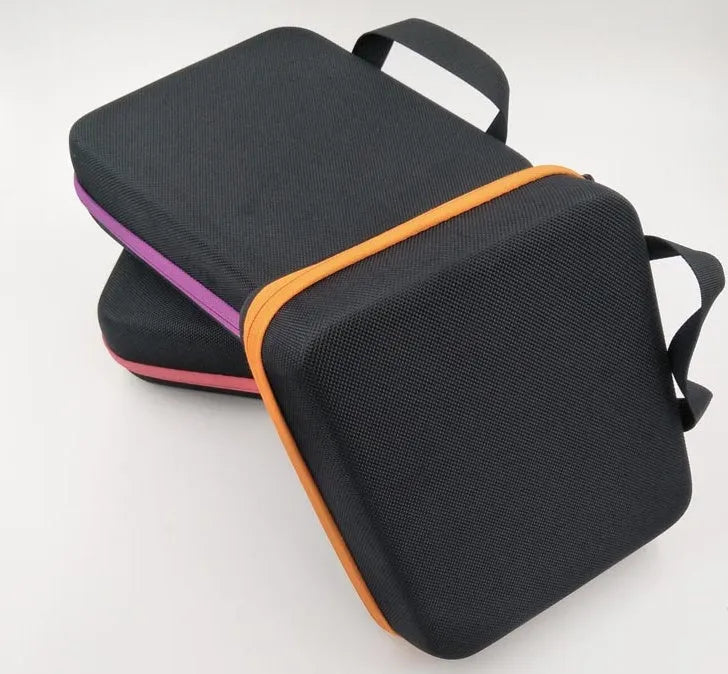 Red EVA essential oil storage cube bag with 30 compartments for 15ml bottles, showing zipper and compact design