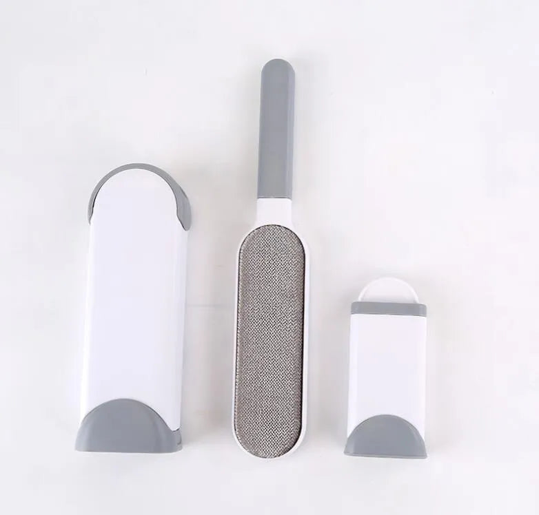 Reusable pet hair removal brush with double-sided roller and self-cleaning base